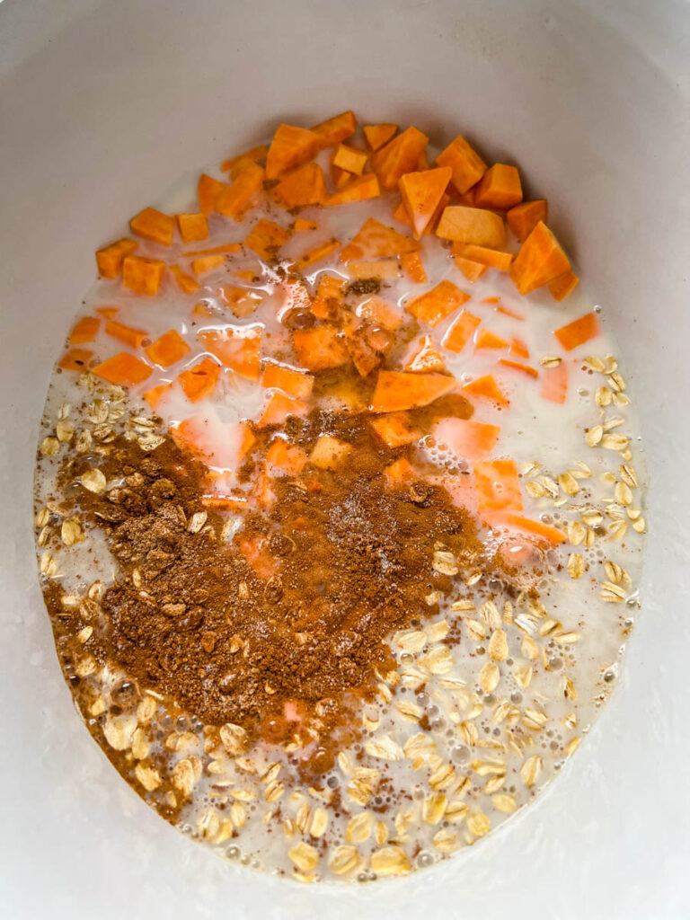 sweet potatoes, rolled oats, cinnamon, almond milk, and nutmeg in a pot