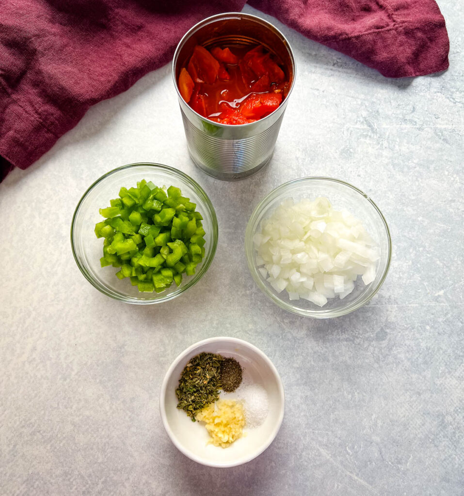 fire roasted tomatoes, green peppers, onions, and spices in separate bowls