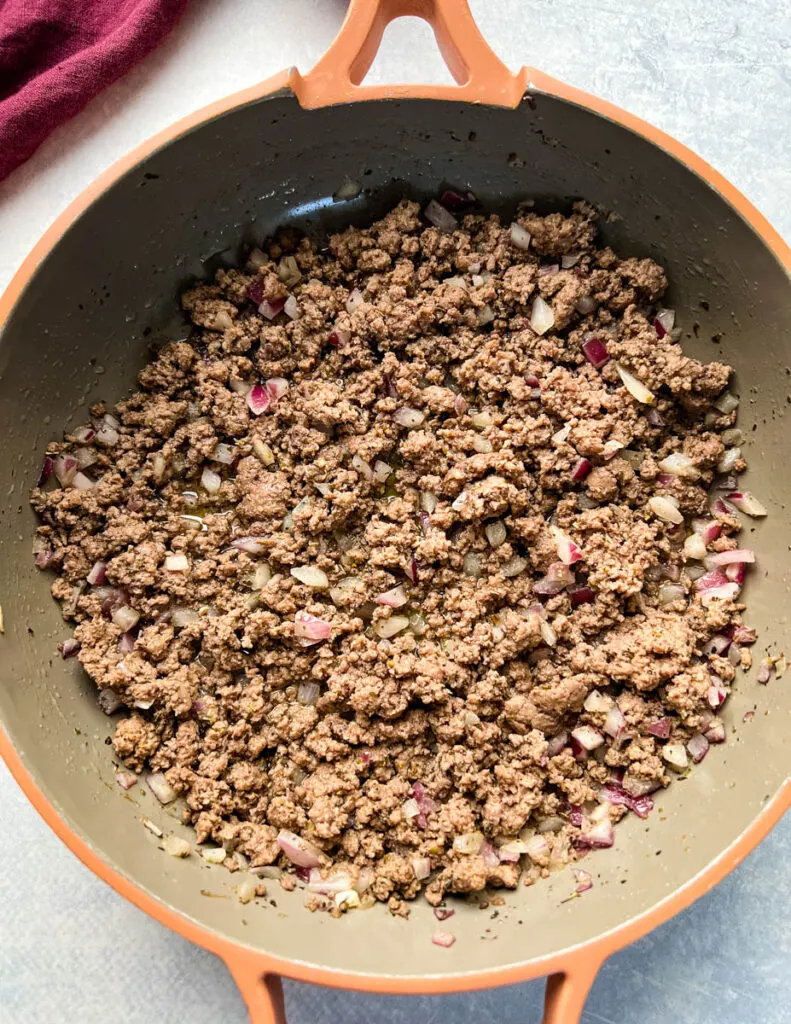 cooked ground beef in a skillet