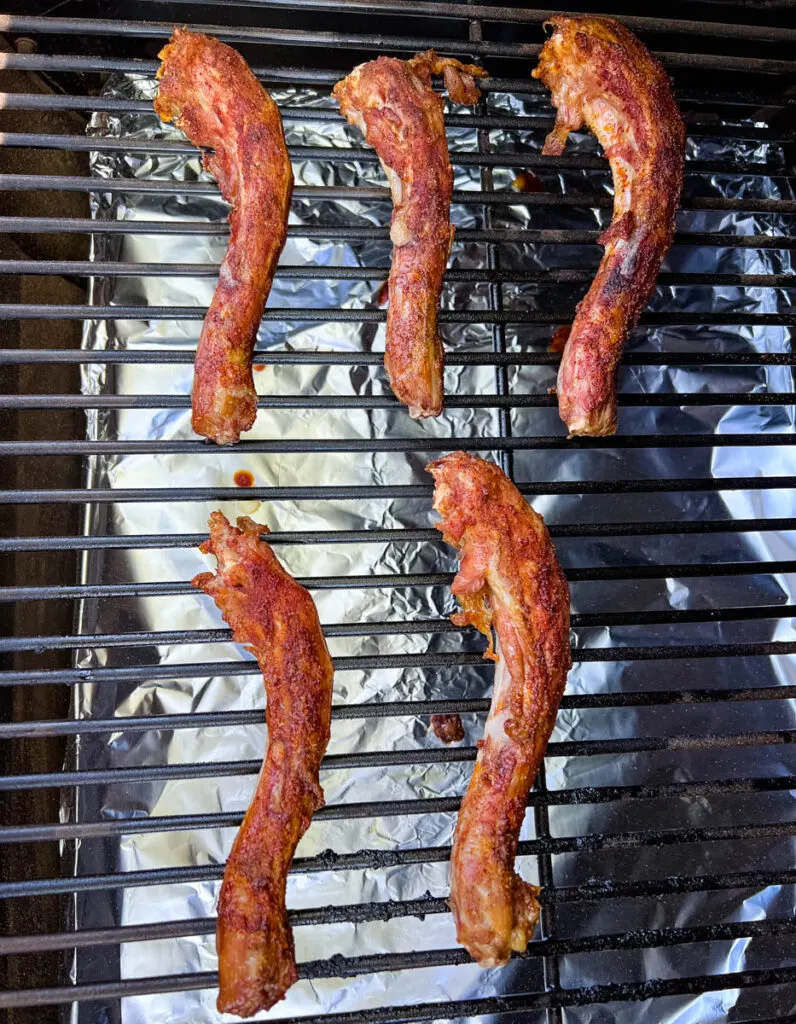 smoked turkey necks on a smoker