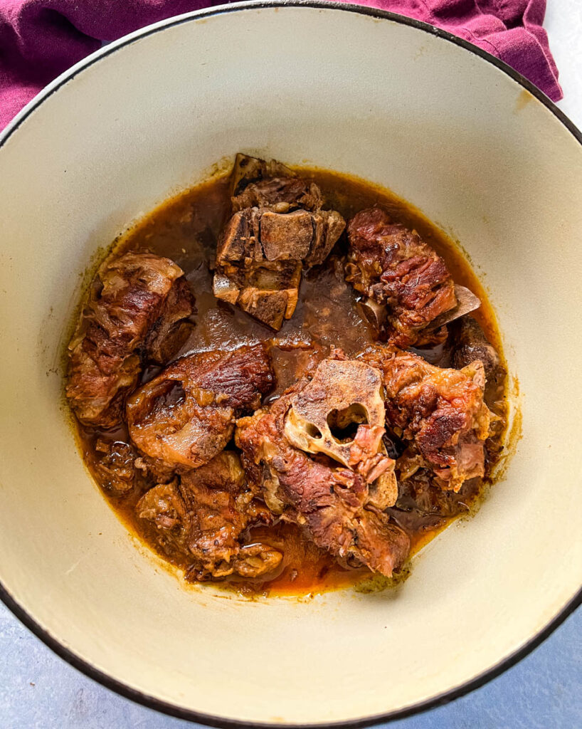 neck bones in a Dutch oven pot