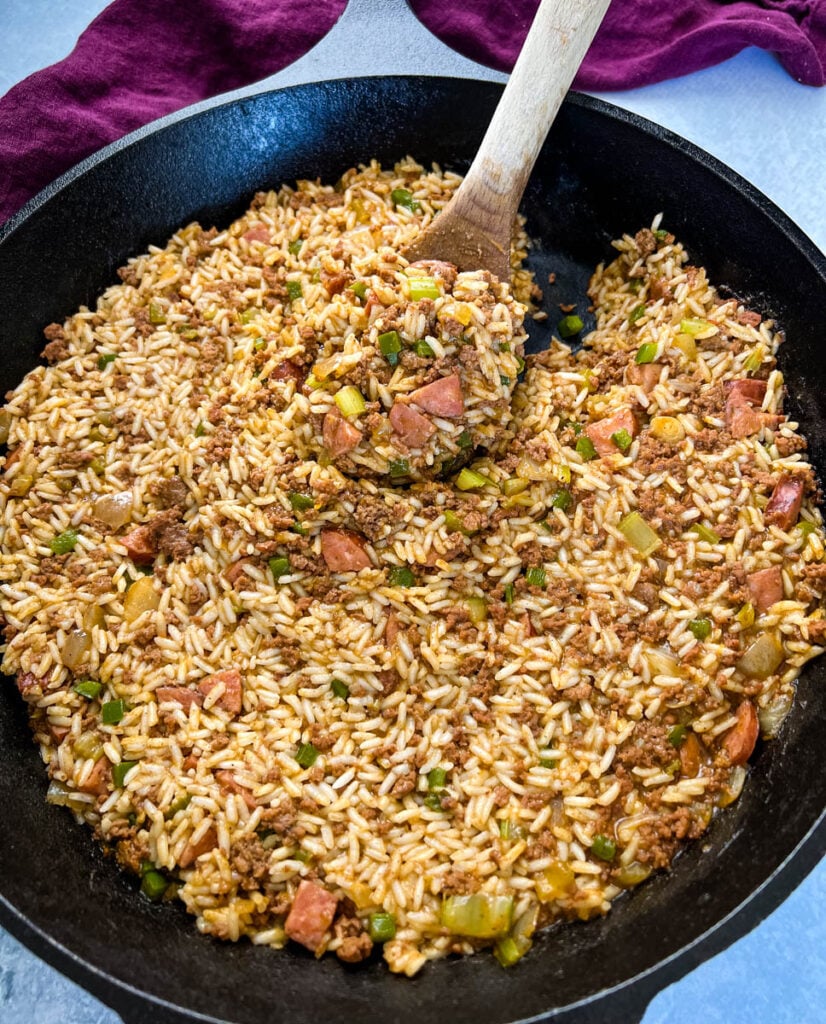 Cajun dirty rice in a cast iron skillet