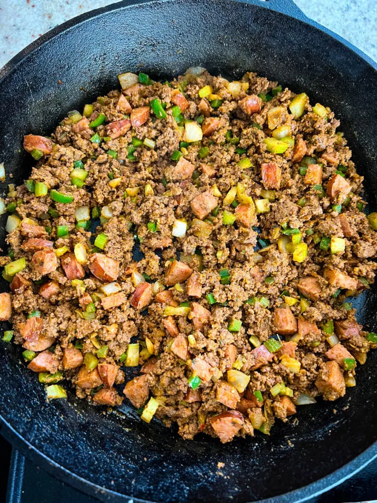 Cajun dirty rice in a cast iron skillet