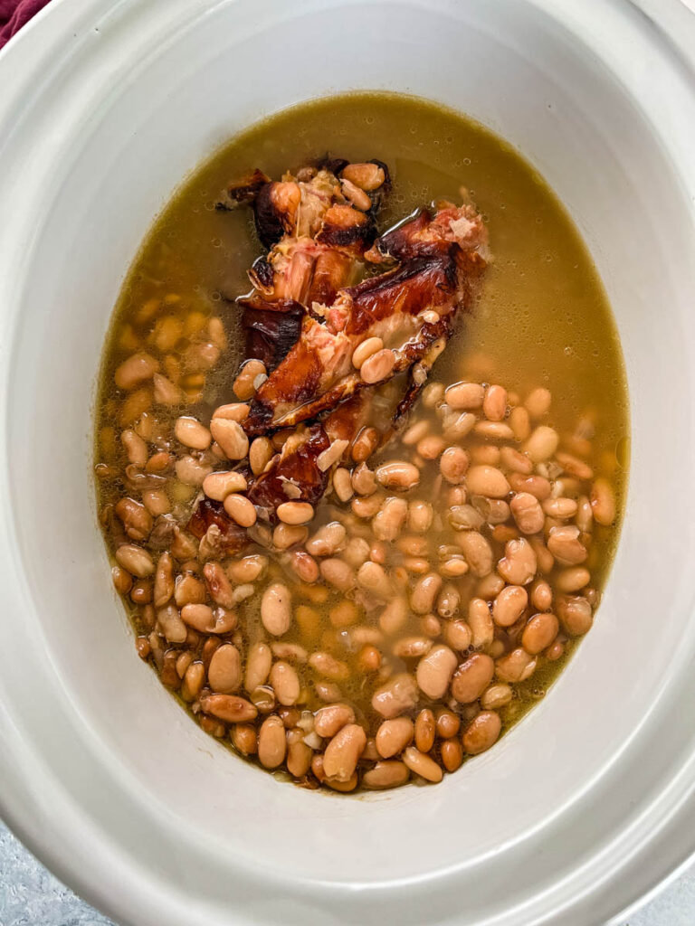pinto beans and smoked turkey in a slow cooker Crockpot