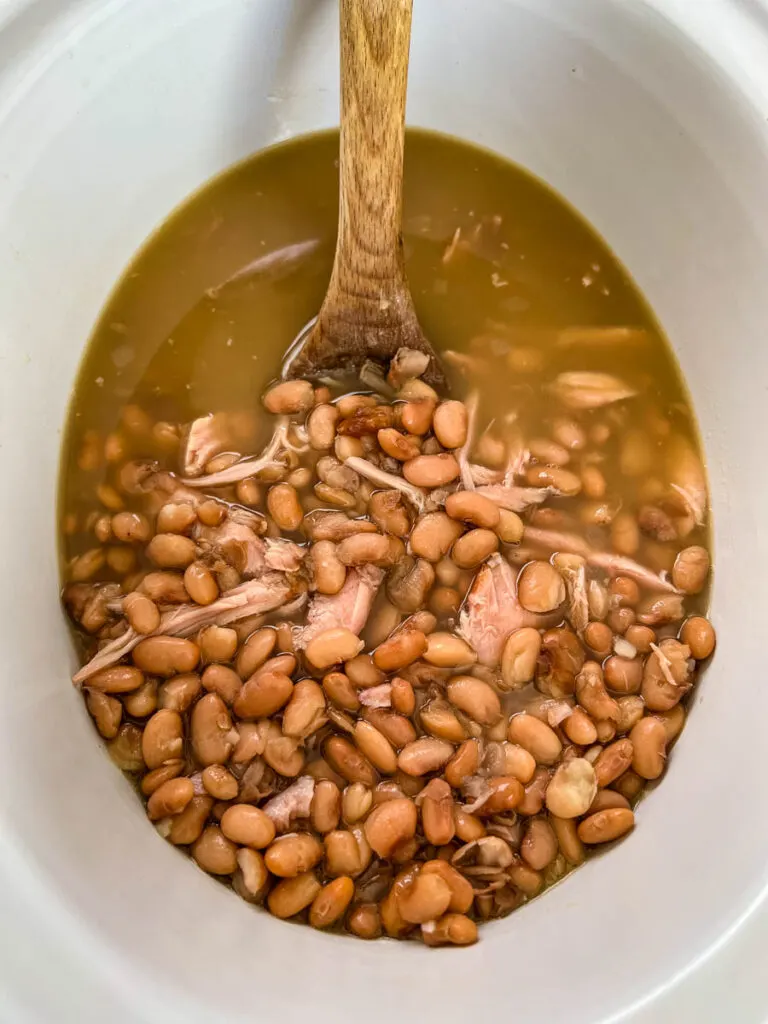 pinto beans and smoked turkey in a slow cooker Crockpot