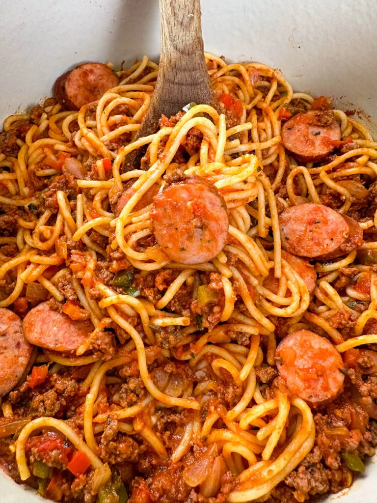 beef and sausage spaghetti in a Dutch oven