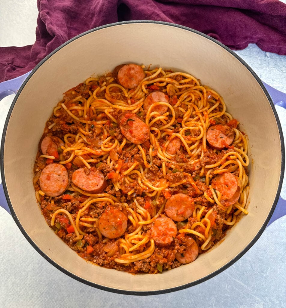 beef and sausage spaghetti in a Dutch oven