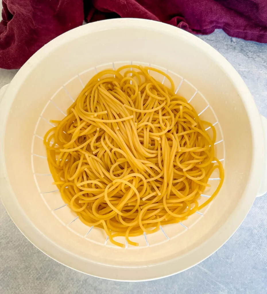 cooked pasta in a colander