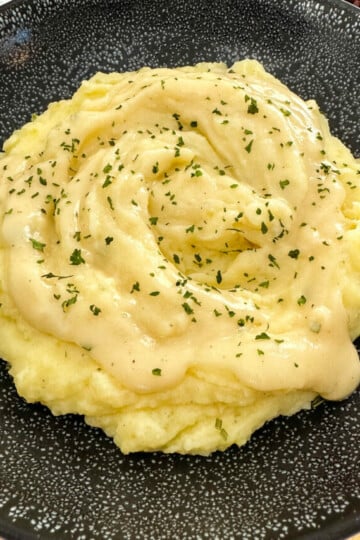 Southern buttermilk mashed potatoes in a black bowl