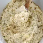 mashed potatoes in a Crockpot slow cooker with butter