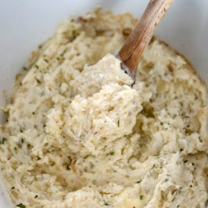 mashed potatoes in a Crockpot slow cooker with butter