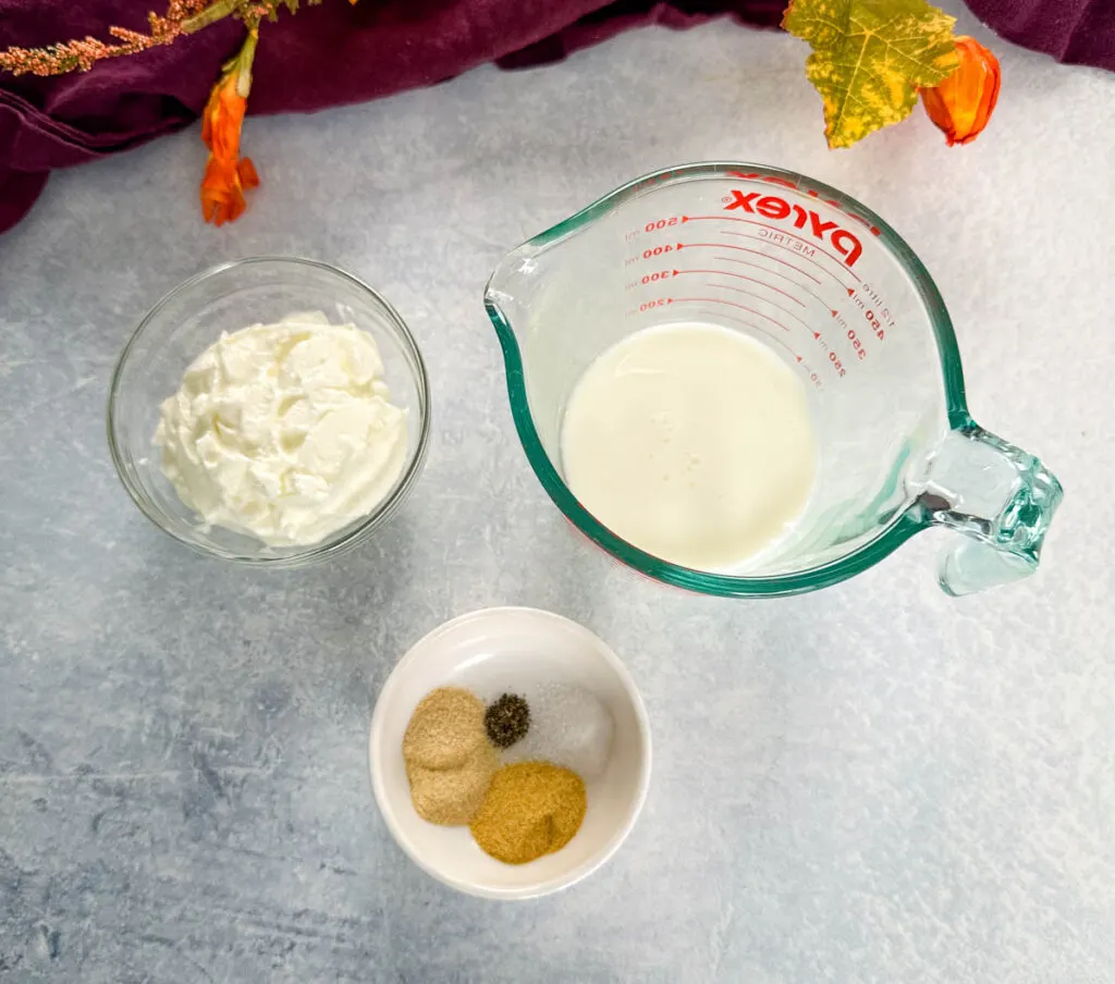 buttermilk, sour cream, and spices in separate bowls