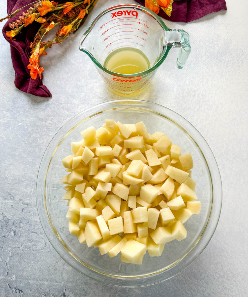 diced potatoes and broth in separate bowls