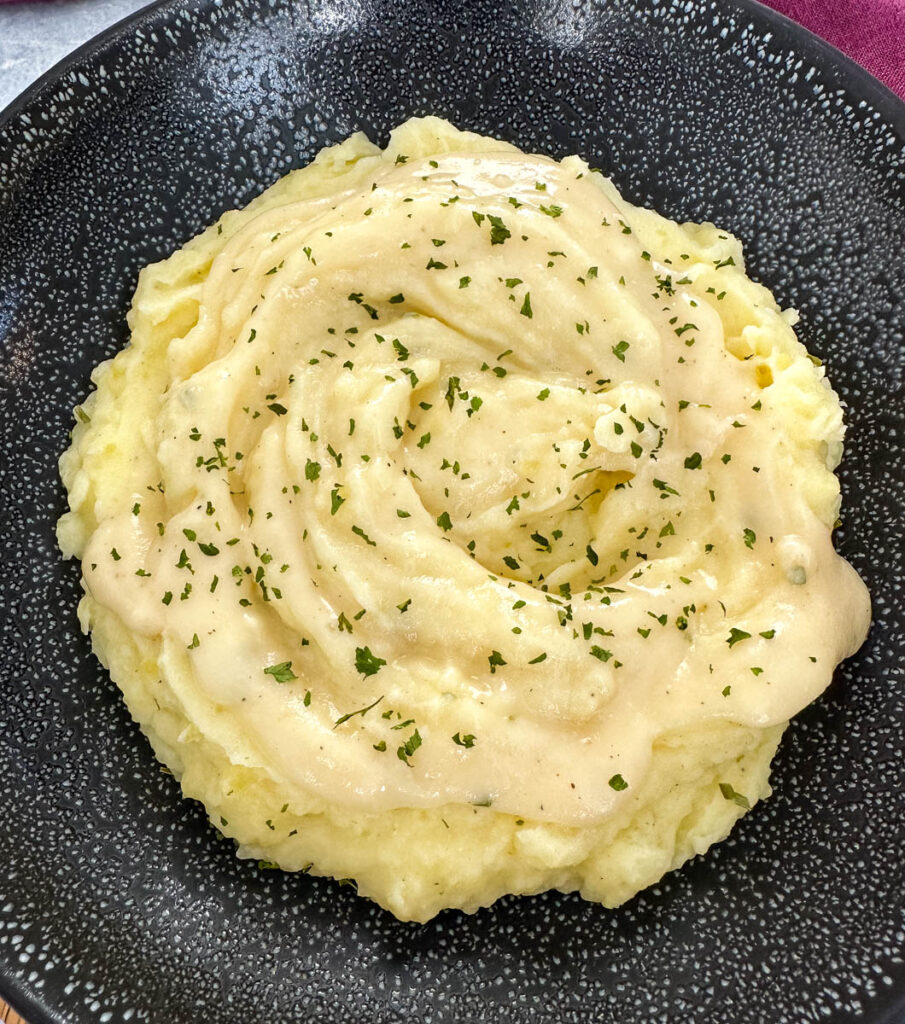 Southern buttermilk mashed potatoes in a black bowl