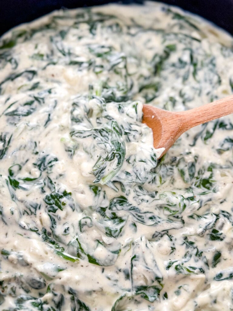 steakhouse creamed spinach in a cast iron skillet