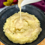 yellow gravy without drippings drizzled over mashed potatoes