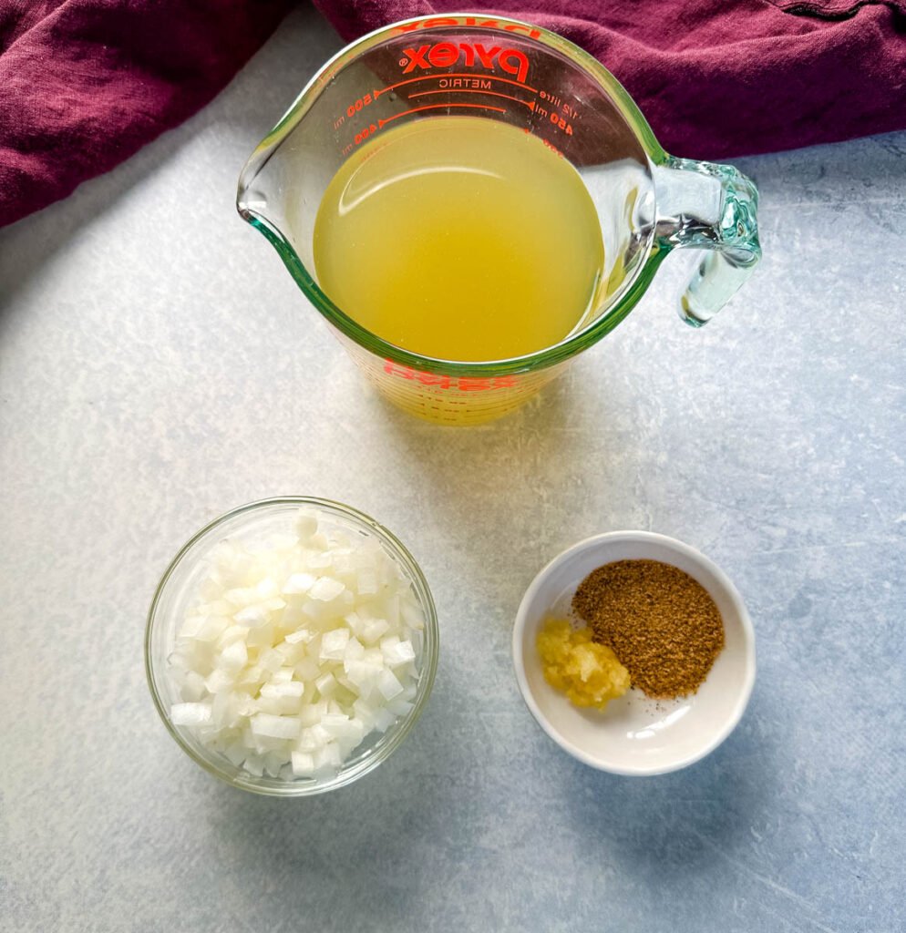 broth, onions, and spices in separate bowls