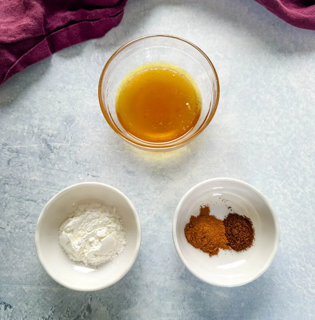 honey, cornstarch, cinnamon, and cloves in separate bowls