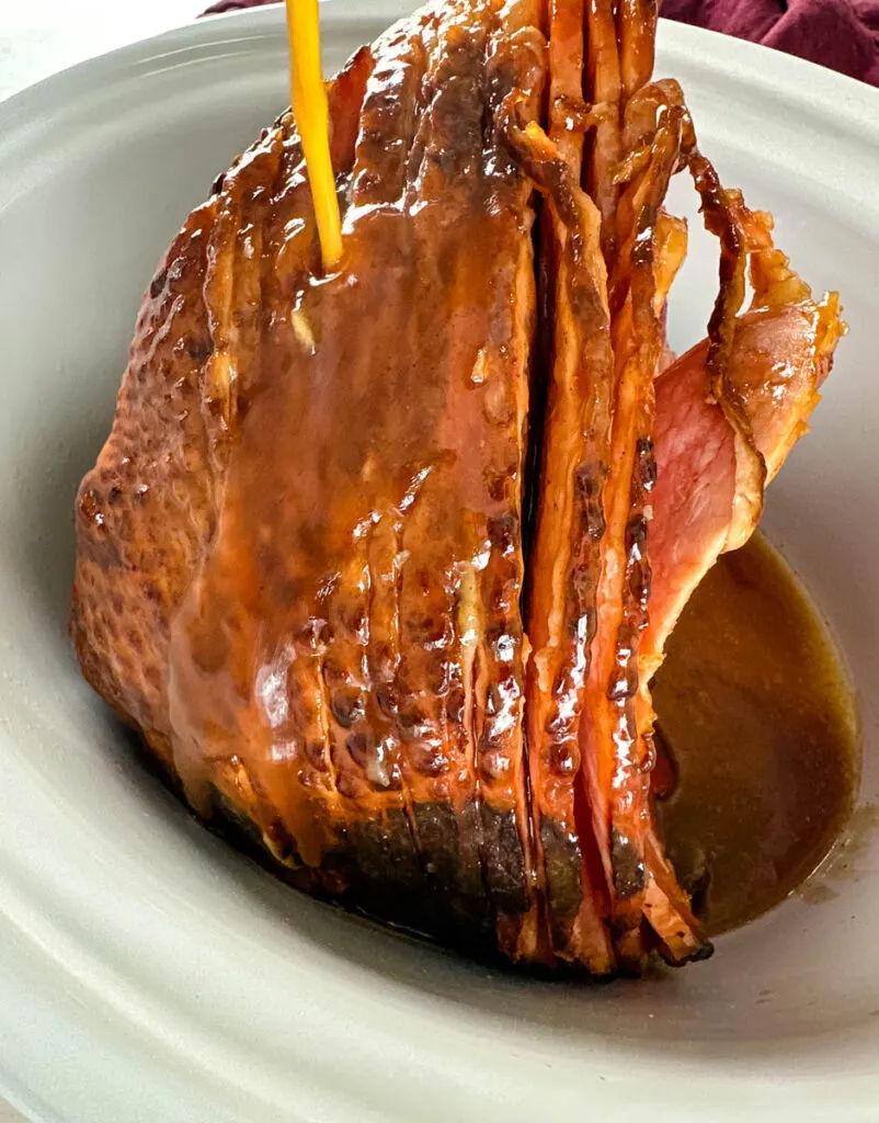 ham in a slow cooker Crockpot glazed with honey and brown sugar