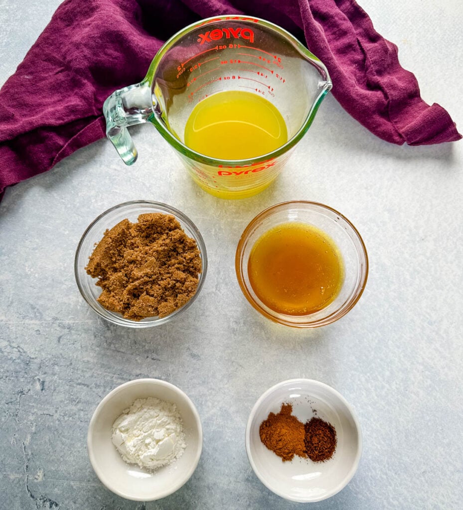 pineapple juice, brown sugar, honey, cornstarch, cinnamon, and cloves in separate bowls