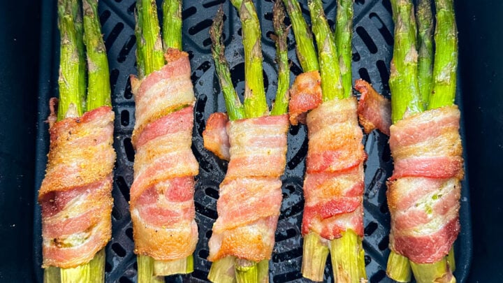 cooked bacon wrapped asparagus in an air fryer