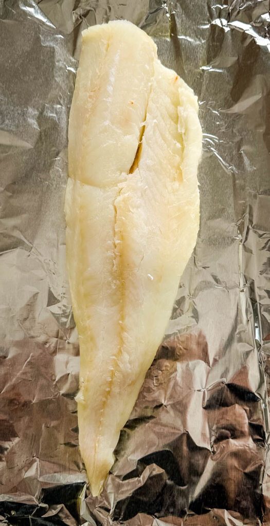 raw cod wrapped in foil
