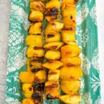 grilled mango on a blue plate