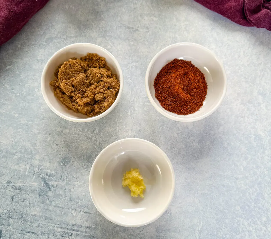 brown sugar, chili powder, and garlic in separate bowls
