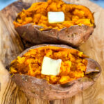 smoked sweet potatoes in butter on a flat surface