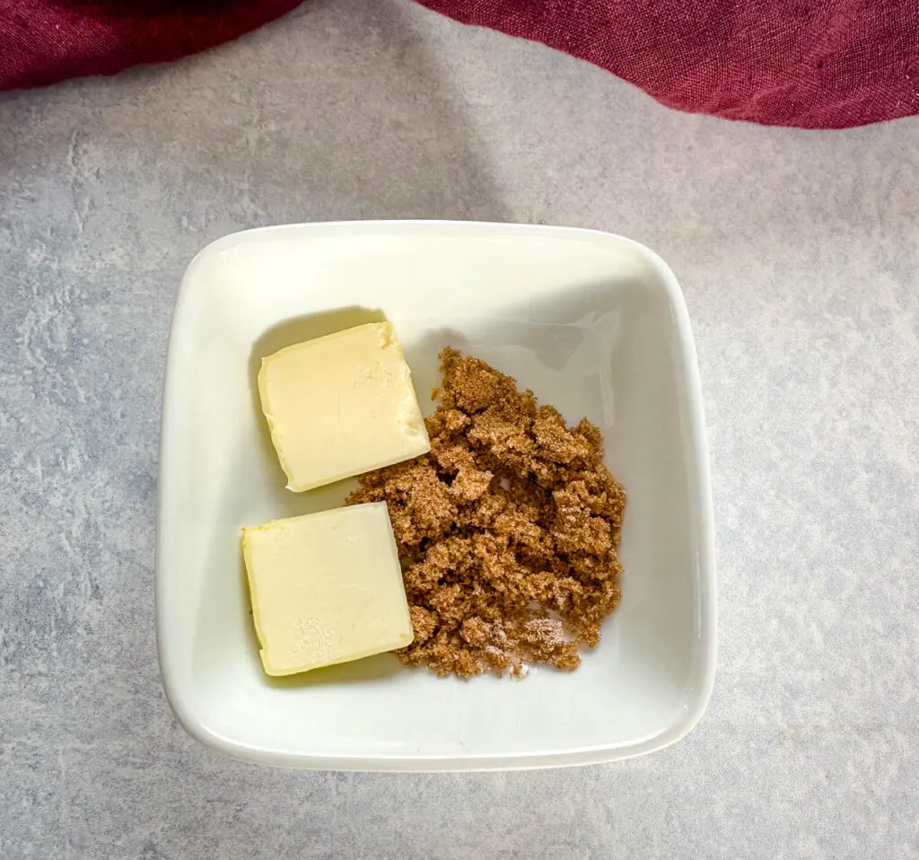 butter and brown sugar in a white bowl