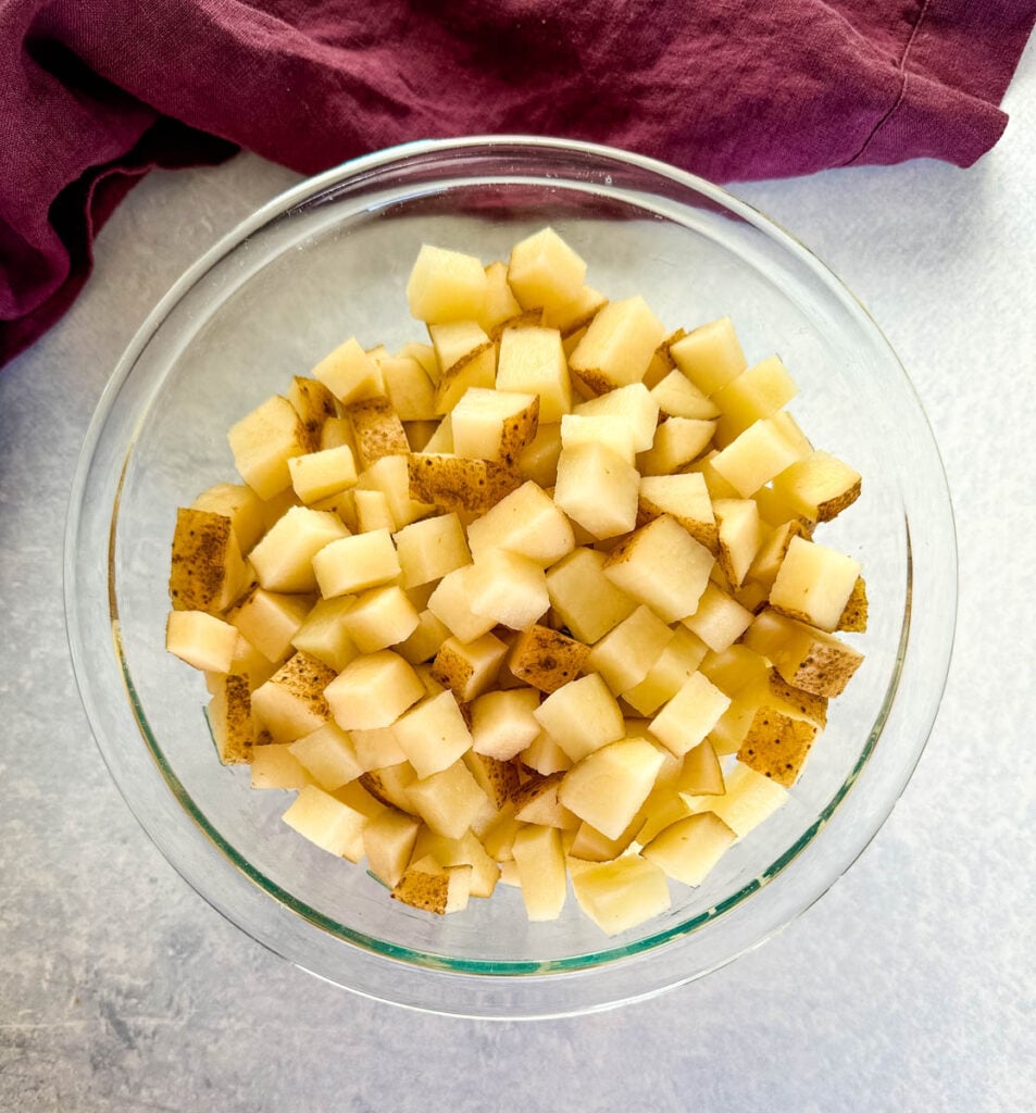 diced russet potatoes in a glass bowl