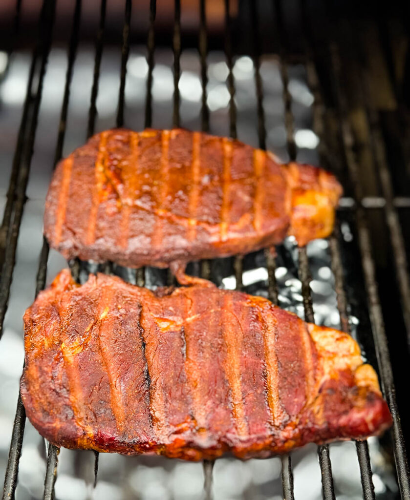 smoked ribeyes on a Traeger smoker grill