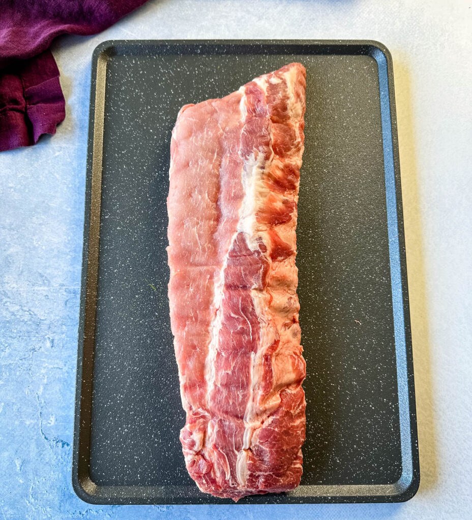 raw pork ribs on a flat surface