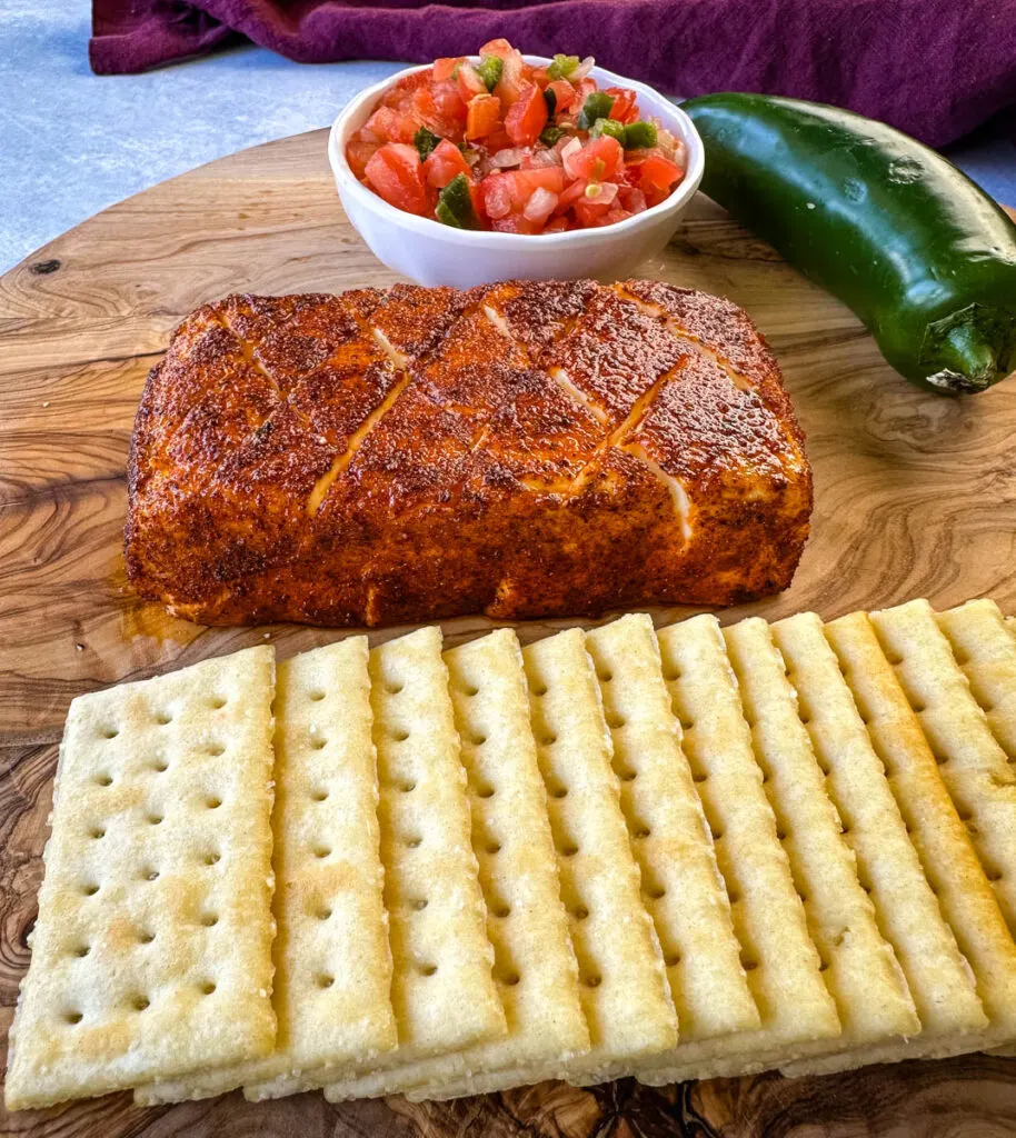 smoked cream cheese on a plate with club crackers