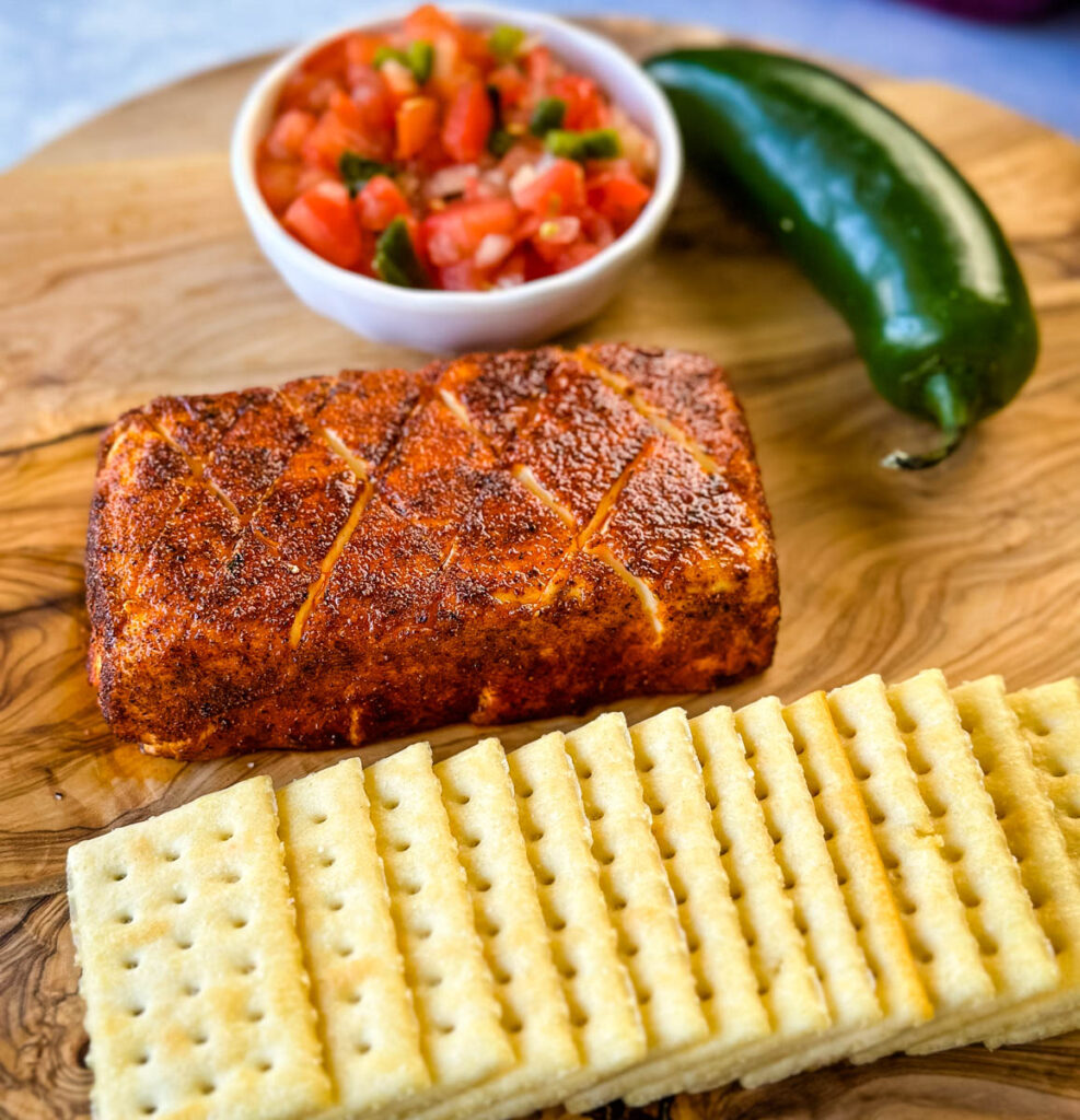 smoked cream cheese on a plate with club crackers