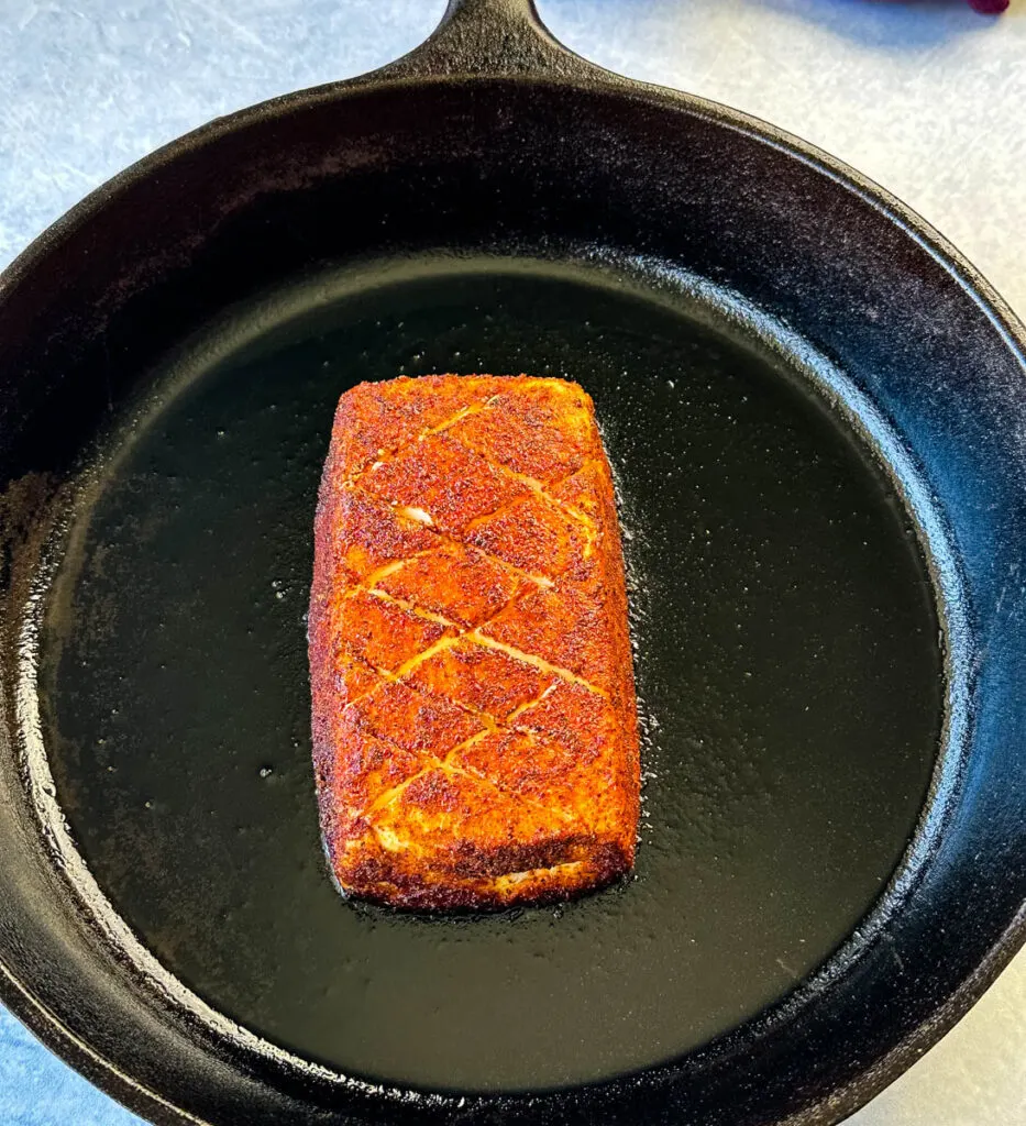 smoked cream cheese in a cast iron skillet