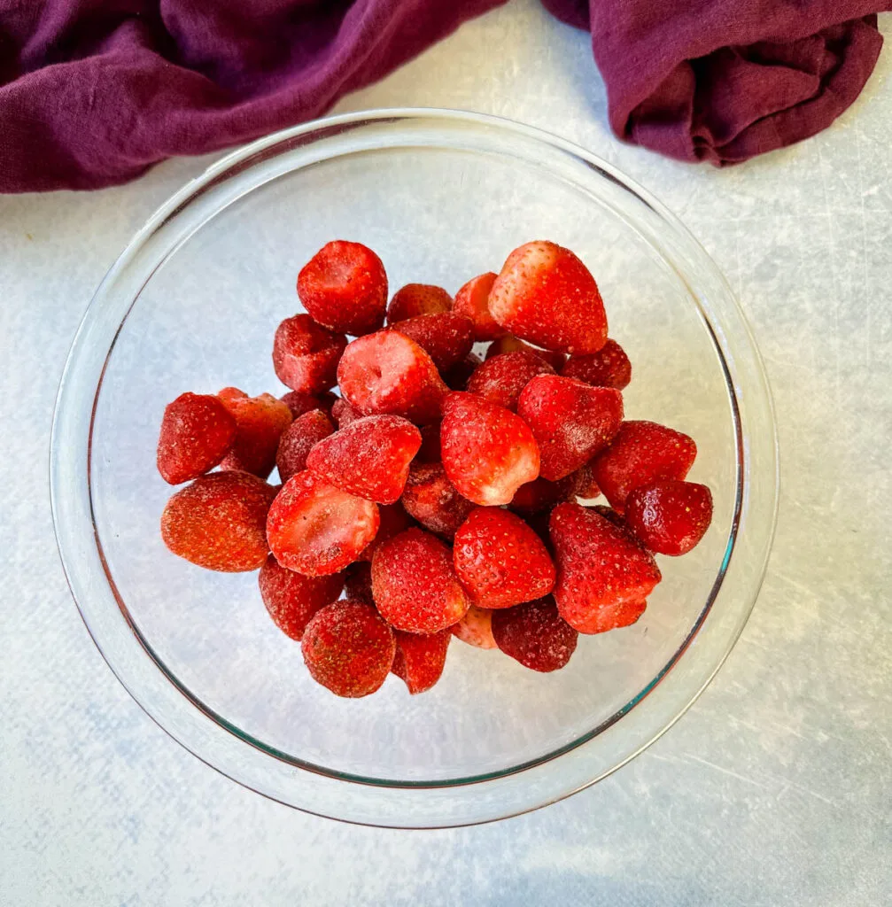 frozen strawberries in a glass bowl