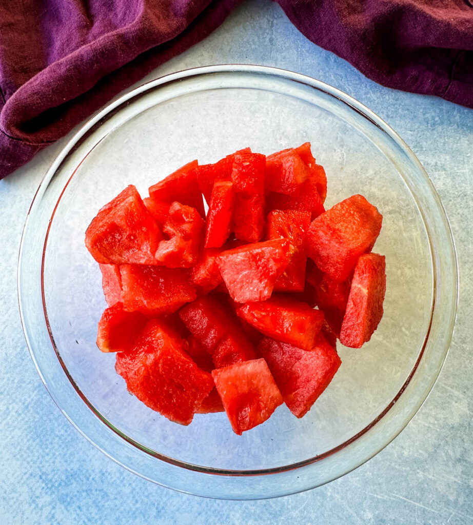 fresh watermelon chunks in a glass bowl