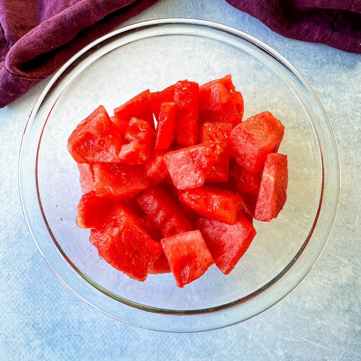 fresh watermelon chunks in a glass bowl