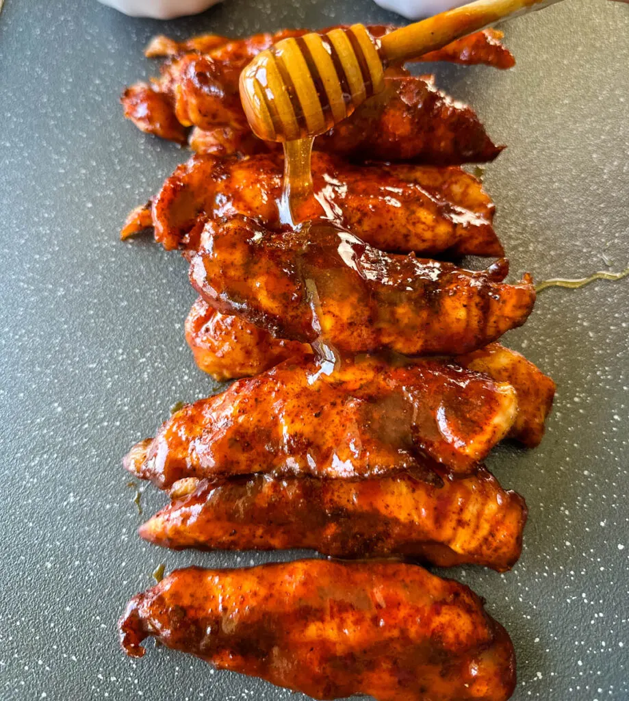 smoked chicken tenders drizzled in honey bbq sauce