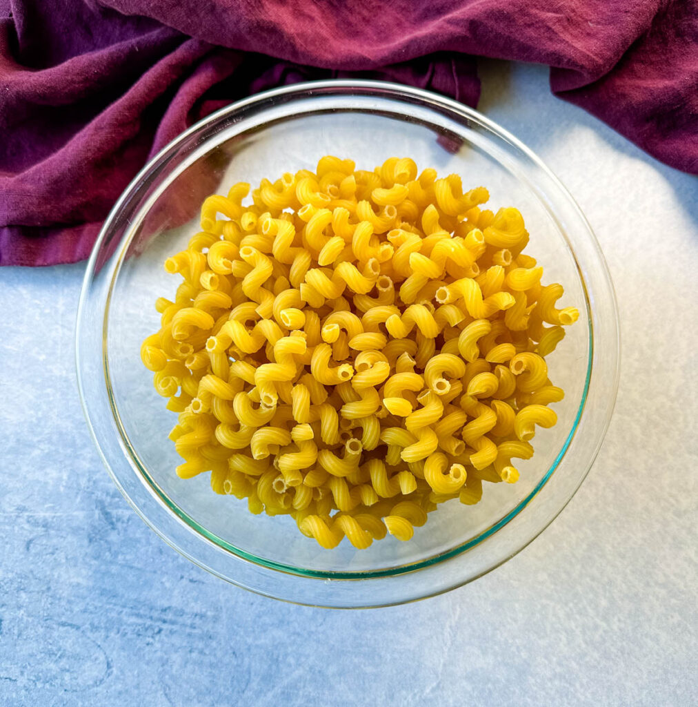 dry corkscrew pasta in a glass bowl