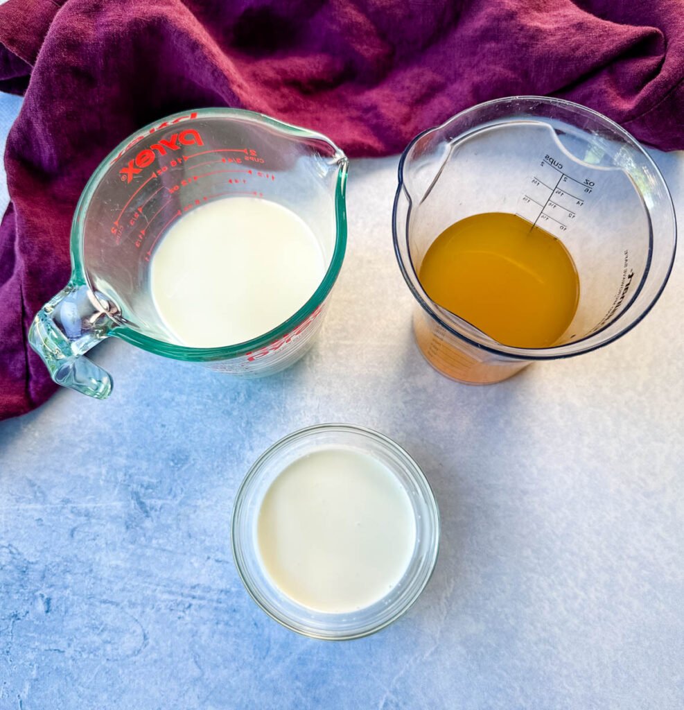 milk, heavy cream, and broth in separate bowls