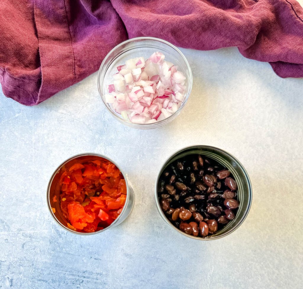 chopped onions, canned rotel diced tomatoes and chilies, and canned black beans