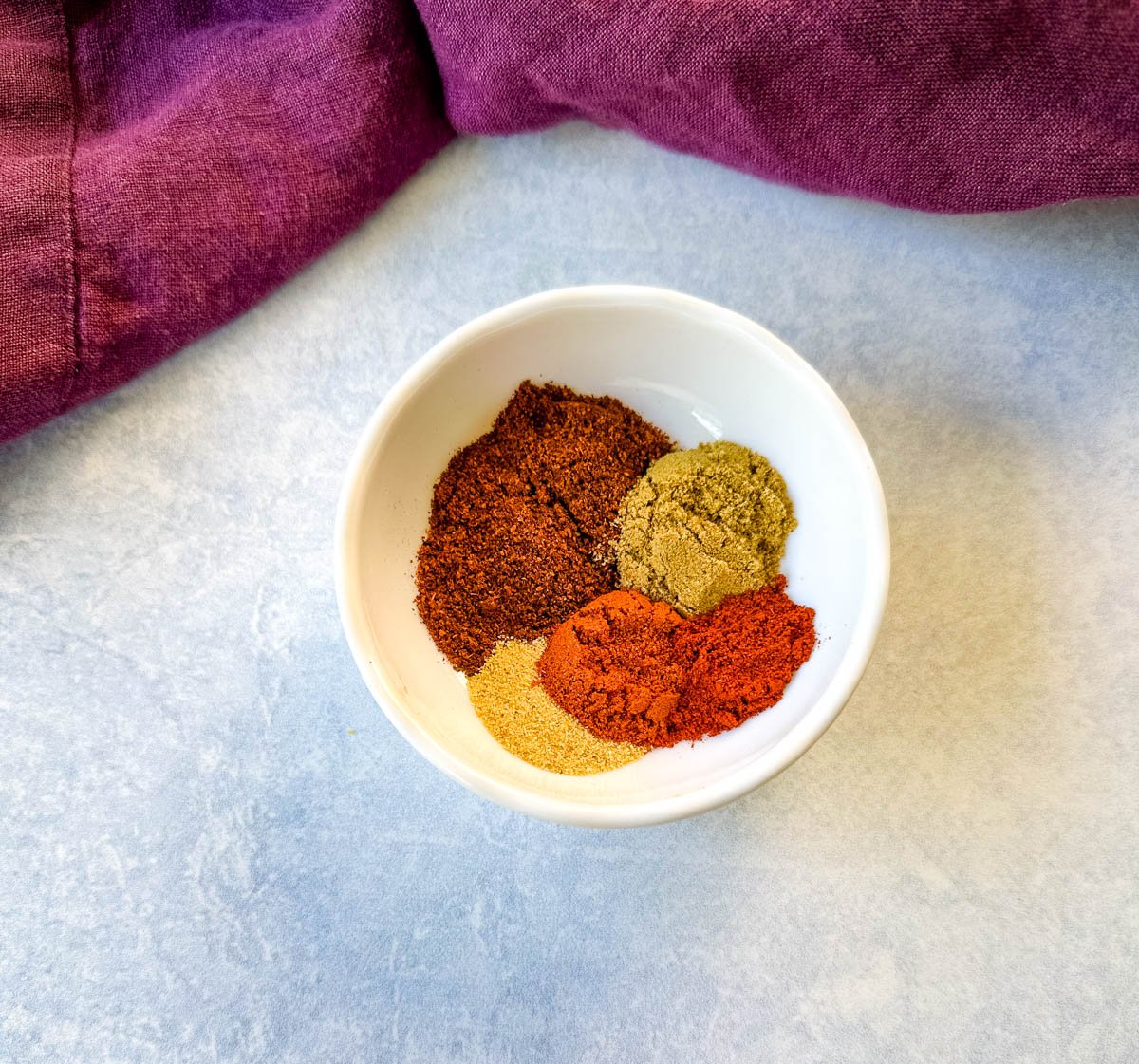 homemade taco seasoning spices in a white bowl