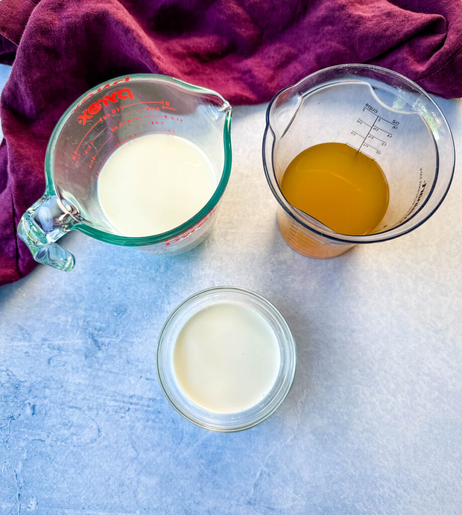 milk, heavy cream, and broth in separate bowls