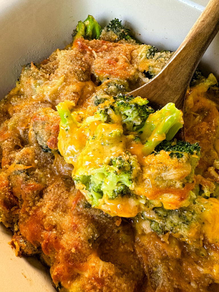 broccoli au gratin with cheese and breadcrumbs in a baking dish