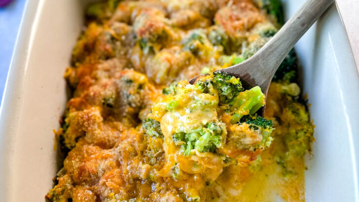 broccoli au gratin with cheese and breadcrumbs in a baking dish