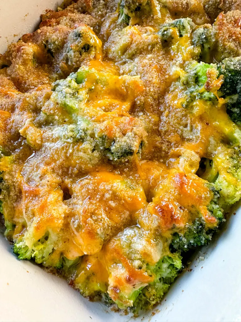 broccoli au gratin with cheese and breadcrumbs in a baking dish