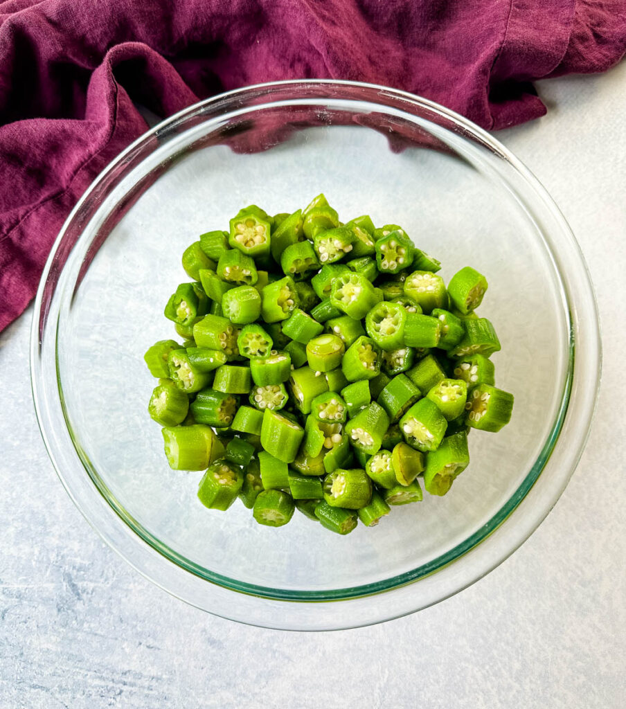 fresh okra in a glass bowl