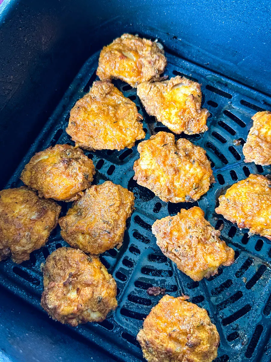 cooked KFC breaded chicken tender in an air fryer